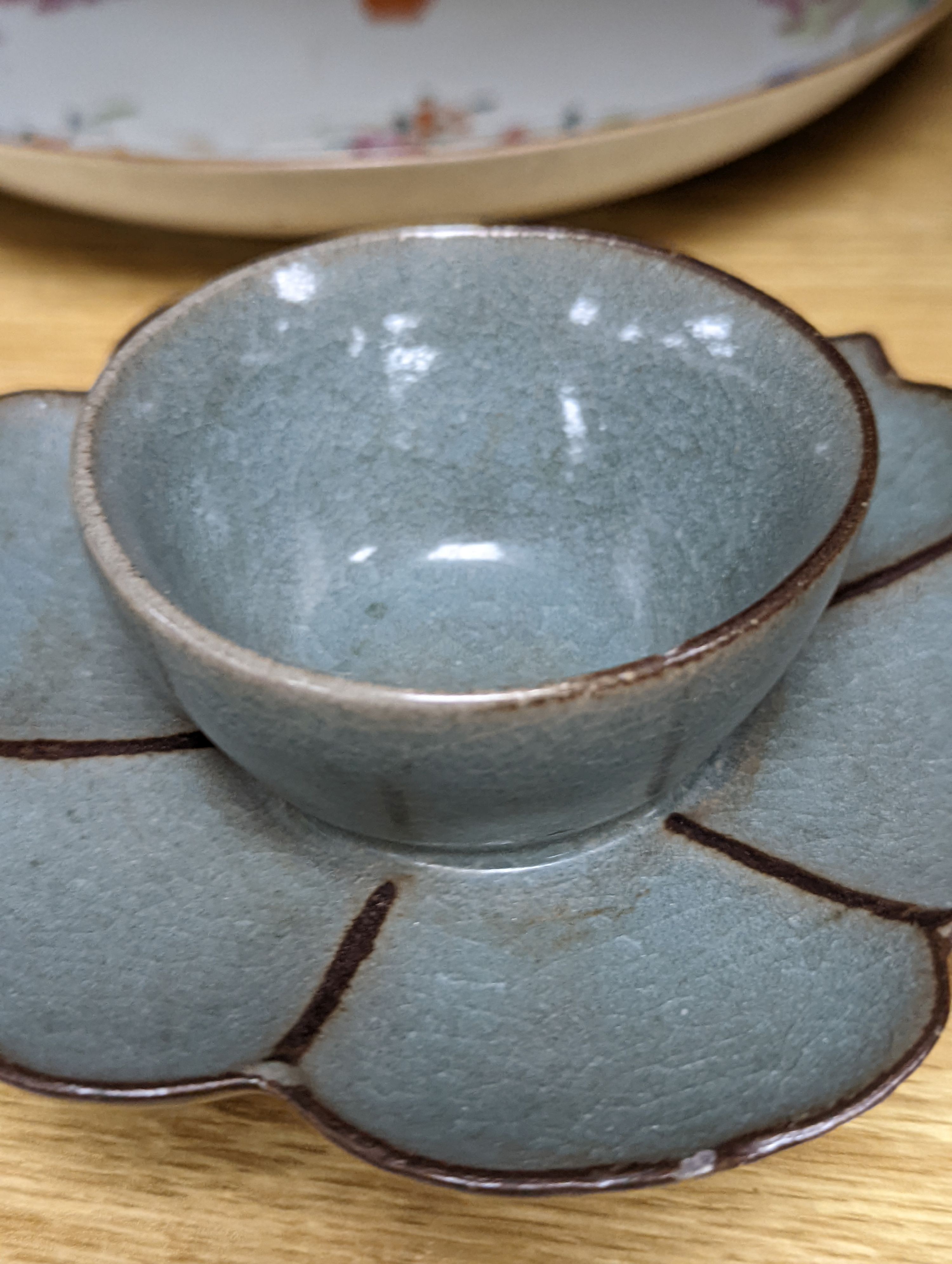 An 18th century Chinese famille rose dish, crackle-glaze stem cup, Beijing glass tea bowl and a Chinese Imari plate. Largest 24cm